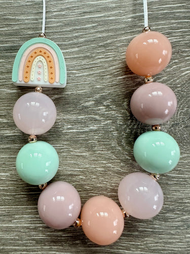 Muted rainbow statement