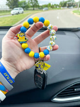 Load image into Gallery viewer, Coming to Theaters- Minion wristlet keychain